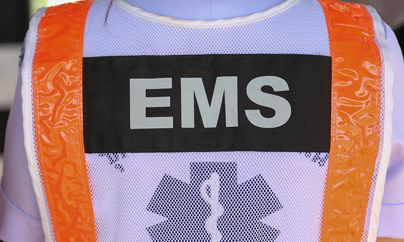 Orange and white EMS vest