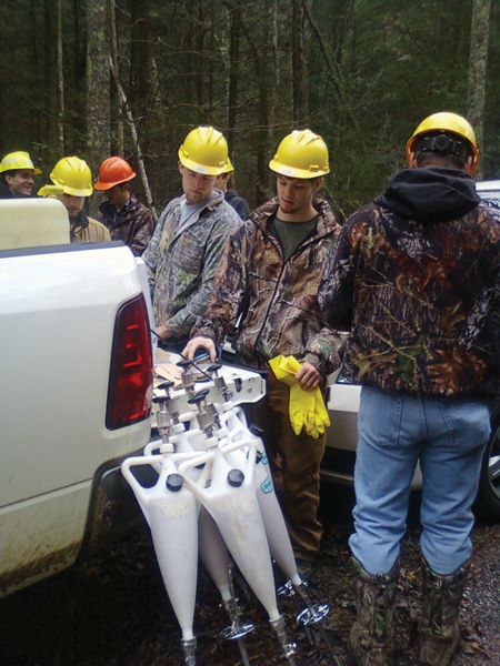 CSCC Students in Robert Brewer's “Introduction to Forestry, Wildlife, and Fisheries” class preparing to treat Hemlock trees in the Cherokee National Forest, to control insect damage.