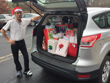 CSCC Employee Larry Burns delivers gifts to residents at Bradley Healthcare and Rehabilitation of Cleveland.